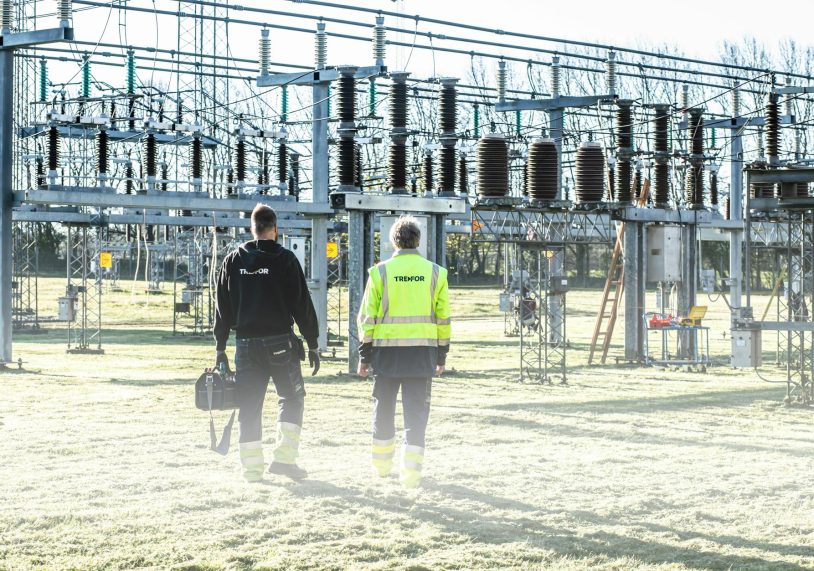 workers at electrical transformer substation